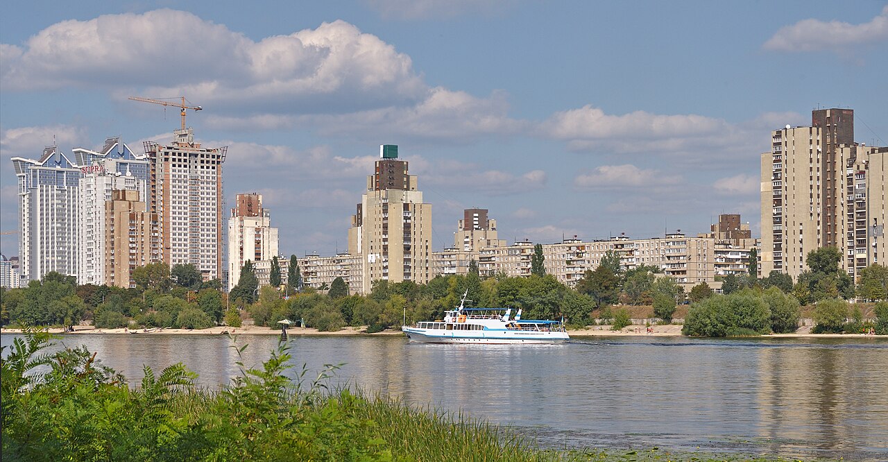 View of the District Berezniaky from Malyi Island. Dnipro river in Kyiv